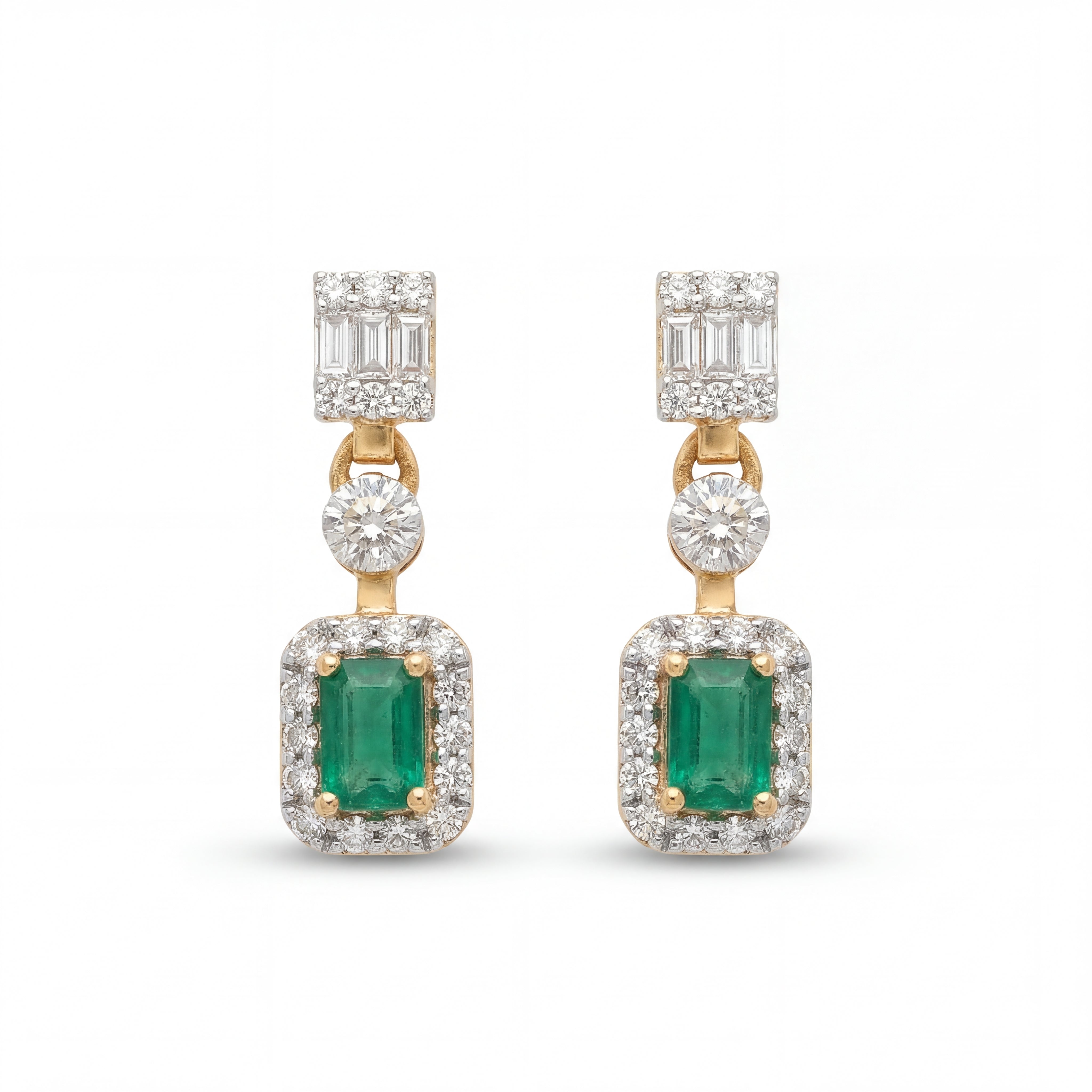 Elegant 18KT gold drop earrings featuring emerald-cut green gemstones with diamond halos and baguette diamond tops on a white background.