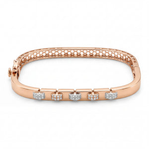 Beautiful 18KT rose gold bracelet showcasing sleek curved design with alternating diamond-set motifs on a white background.
