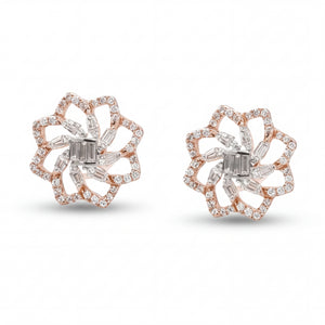 Elegant 18KT rose gold stud earrings featuring floral openwork design with baguette and round diamond accents on a white background.