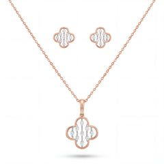 Beautiful 18KT rose gold necklace set showcasing floral clover motifs with sparkling diamond accents and matching earrings on a white background.