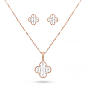 Beautiful 18KT rose gold necklace set showcasing floral clover motifs with sparkling diamond accents and matching earrings on a white background.