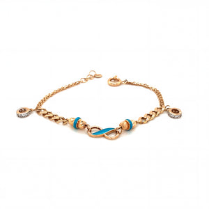 Luxurious 18KT rose gold bracelet featuring blue enamel infinity centerpiece with diamond-set protective charms on a white background.
