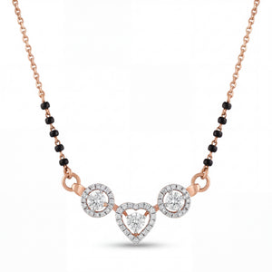 Elegant 18K rose gold diamond heart mangalsutra pendant necklace featuring heart shaped center diamond motif with round diamond halo accents and black bead chain by Pachchigar Jewellers Ashokbhai