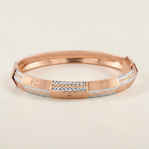 Premium 18K rose gold dual-tone designer kada featuring engraved screw motifs, textured white gold accents, and a sleek modern finish. Elegant luxury bracelet by Pachchigar Jewellers.