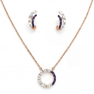Elegant 18K rose gold jewelry set featuring a circular pendant necklace with blue enamel and marquise diamond accents, paired with matching hoop earrings.
