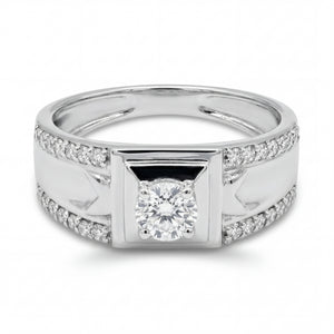 Elegant 18K white gold diamond gents statement ring featuring round center diamond with pavé diamond channel detailing by Pachchigar Jewellers Ashokbhai