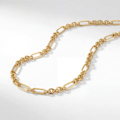 22KT BIS Hallmarked gold paperclip link chain featuring elongated oval links connected with polished round links in a contemporary design. A lightweight, elegant yellow gold chain for men and women, perfect for everyday wear, layering, and gifting from Pachchigar Jewellers.