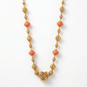 22K gold coral bead floral necklace featuring polished coral beads, intricately crafted filigree gold beads, and an ornate floral centerpiece, designed for a graceful and timeless traditional look.