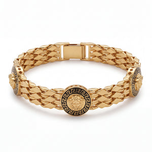 Luxurious 22K yellow gold bracelet featuring multi-row woven links with black enamel Medusa-inspired round motifs and secure clasp on a white background by Pachchigar Jewellers Ashokbhai.