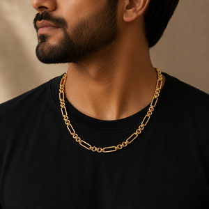 Man wearing a 22K gold modern oval link chain with polished elongated links and round connectors, styled with a black t-shirt for a contemporary everyday look.