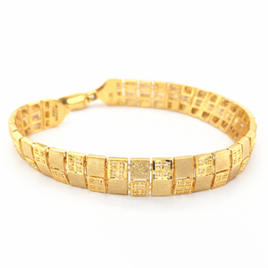 Elegant 22K yellow gold bracelet featuring rectangular textured links with geometric detailing, polished finish, and secure clasp on a white background by Pachchigar Jewellers Ashokbhai.