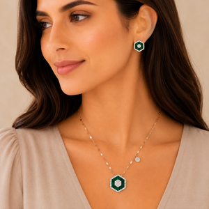 Diamond necklace set with green stone and matching earrings