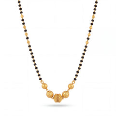 legant gold mangalsutra featuring black bead strands, handcrafted gold bead centerpiece, and timeless traditional design for daily wear and special occasions.