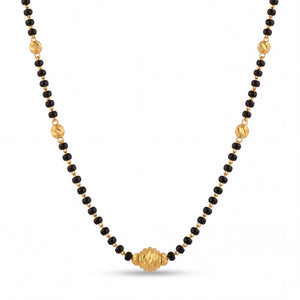 Premium gold mangalsutra with traditional black bead strands, engraved gold center bead pendant, and handcrafted timeless luxury finish by Pachchigar Jewellers Ashokbhai.