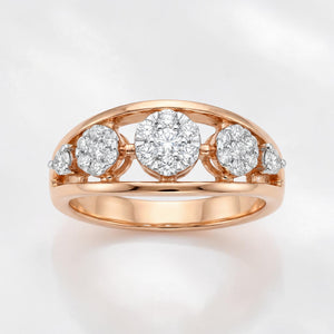 Rose gold ring featuring a central round diamond cluster flanked by two smaller diamond clusters on each side, set in a sleek open gallery design for a refined and timeless look.