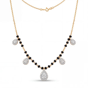 Elegant gold mangalsutra necklace featuring black beads and multiple sparkling teardrop-shaped diamond pendants on a white background.