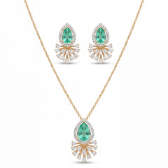Elegant gold jewelry set featuring teardrop-shaped emerald gemstones with sparkling diamond halo detailing in a pendant necklace and matching earrings on a white background.
