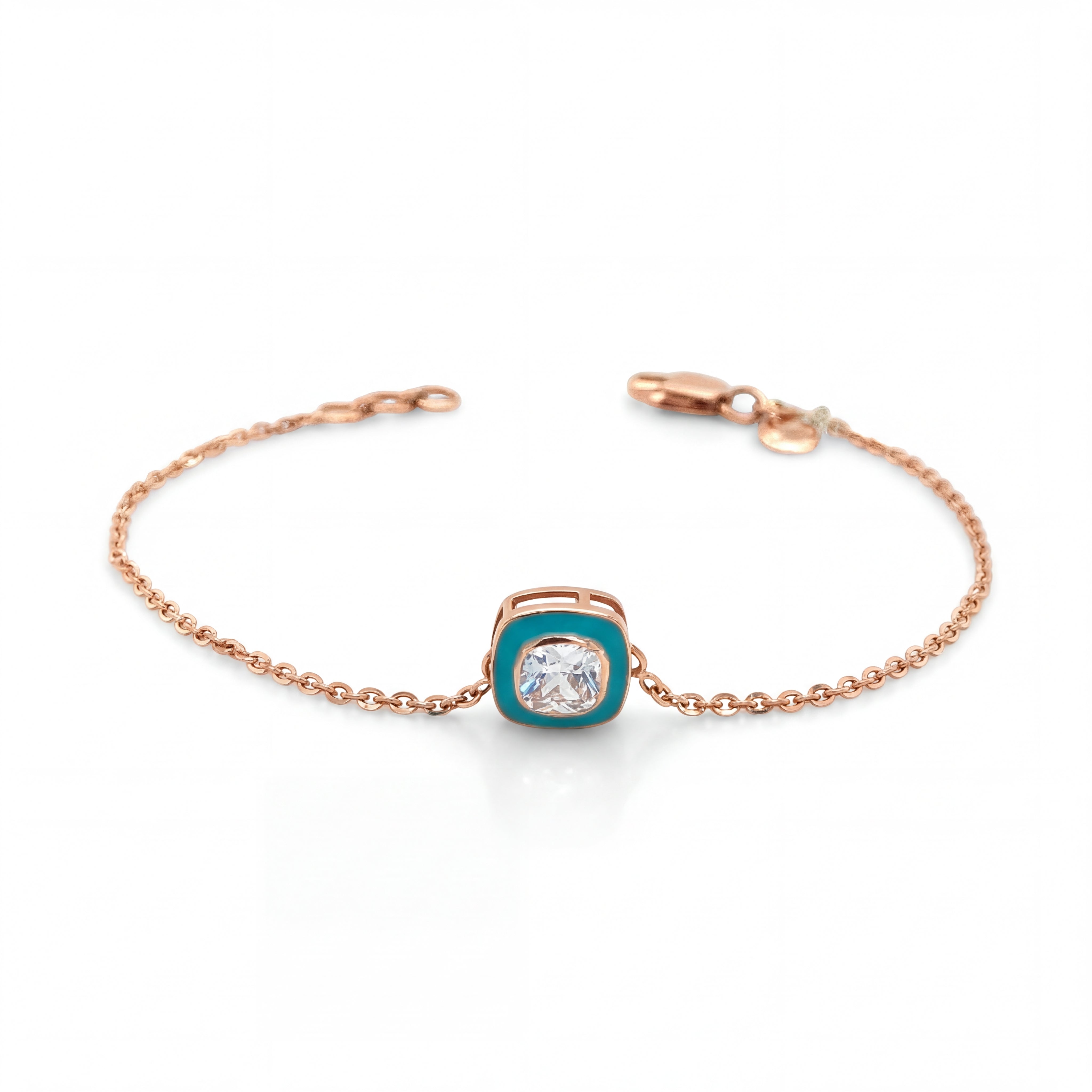 Elegant rose gold bracelet featuring a solitaire crystal centerpiece with turquoise enamel detailing on a delicate chain and adjustable clasp against a white background.