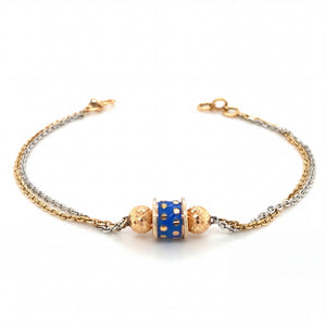 Elegant two-tone gold bracelet featuring a blue enamel centerpiece with textured gold beads on a delicate dual-chain design with adjustable clasp.