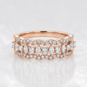 Rose gold eternity-style band featuring alternating marquise and princess-cut diamonds framed by delicate pavé diamonds, creating a vintage-inspired continuous sparkle design.