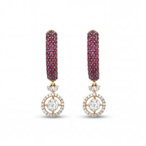 Elegant 18KT gold drop earrings featuring ruby pavé hoops with diamond halo circle drops on a white background.