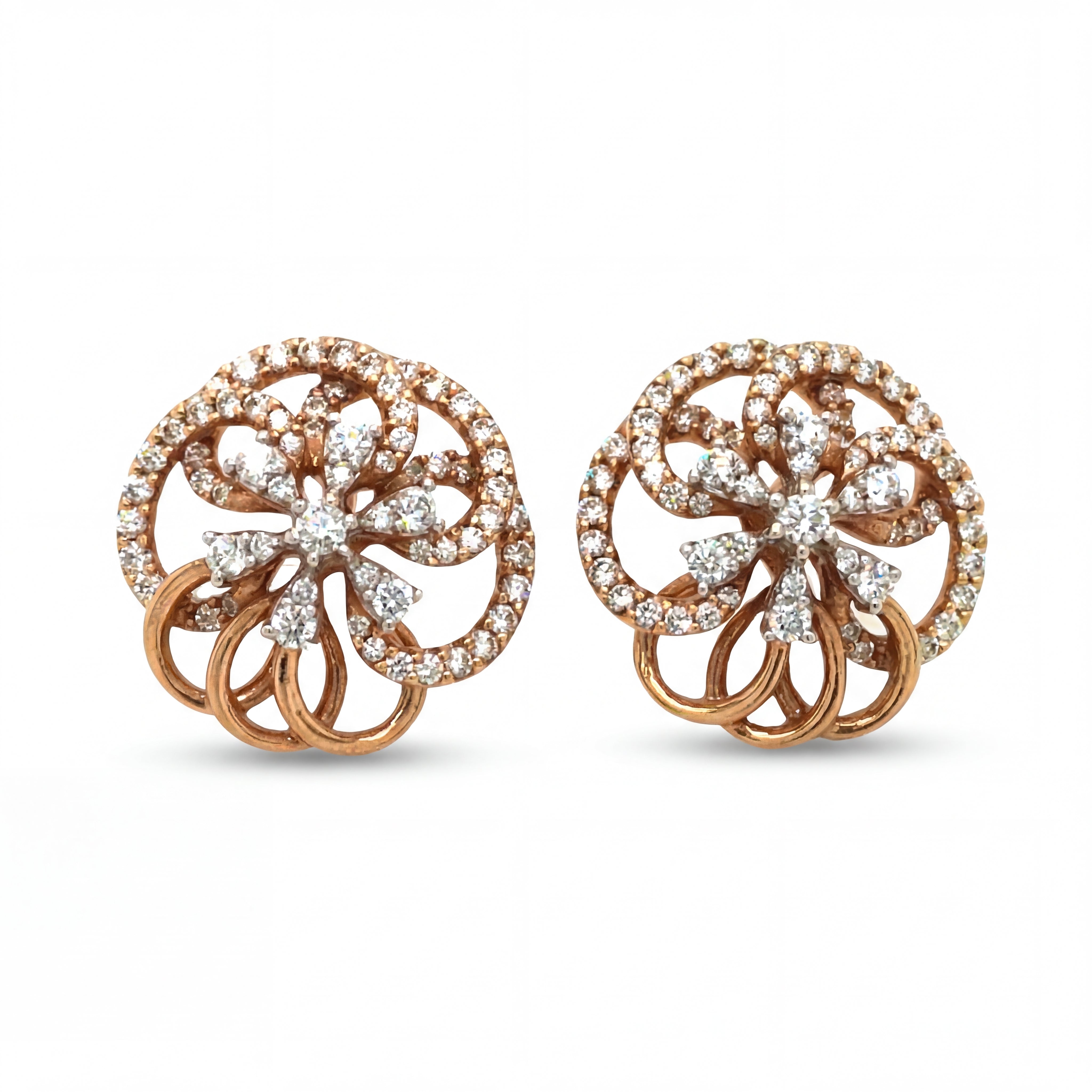 Elegant 18KT rose gold stud earrings featuring circular floral motifs with sparkling diamond accents on a white background.