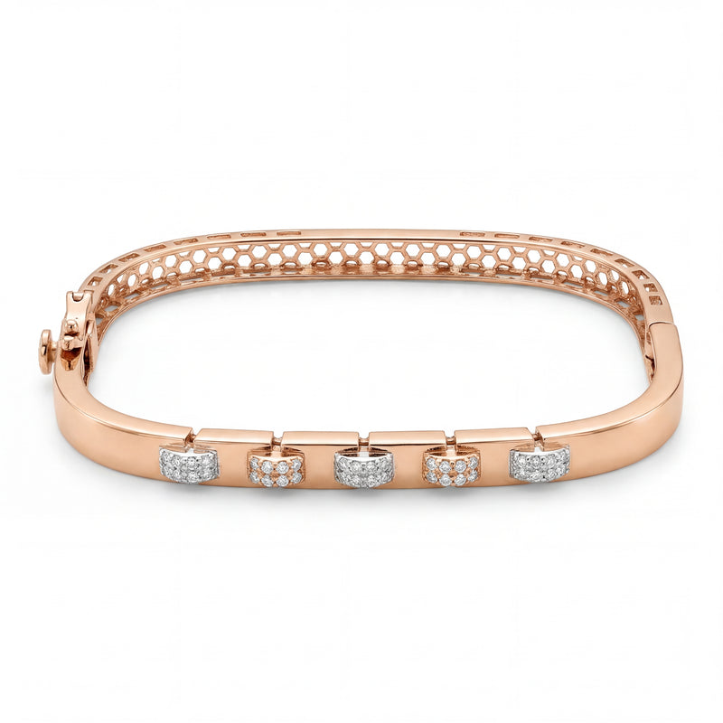 Beautiful 18KT rose gold bracelet showcasing sleek curved design with alternating diamond-set motifs on a white background.