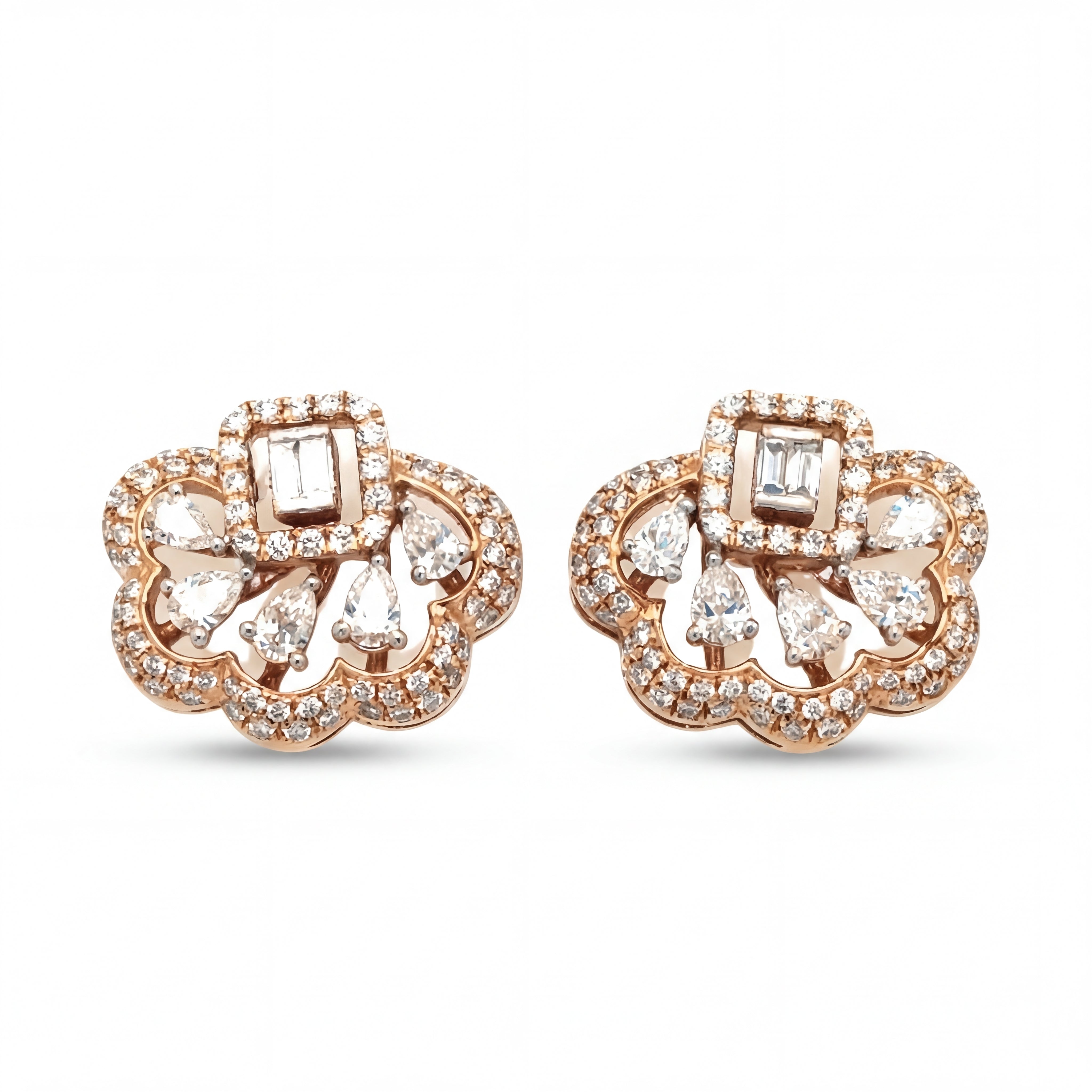 Elegant 18KT rose gold stud earrings featuring floral openwork design with baguette and pear-shaped diamonds on a white background.
