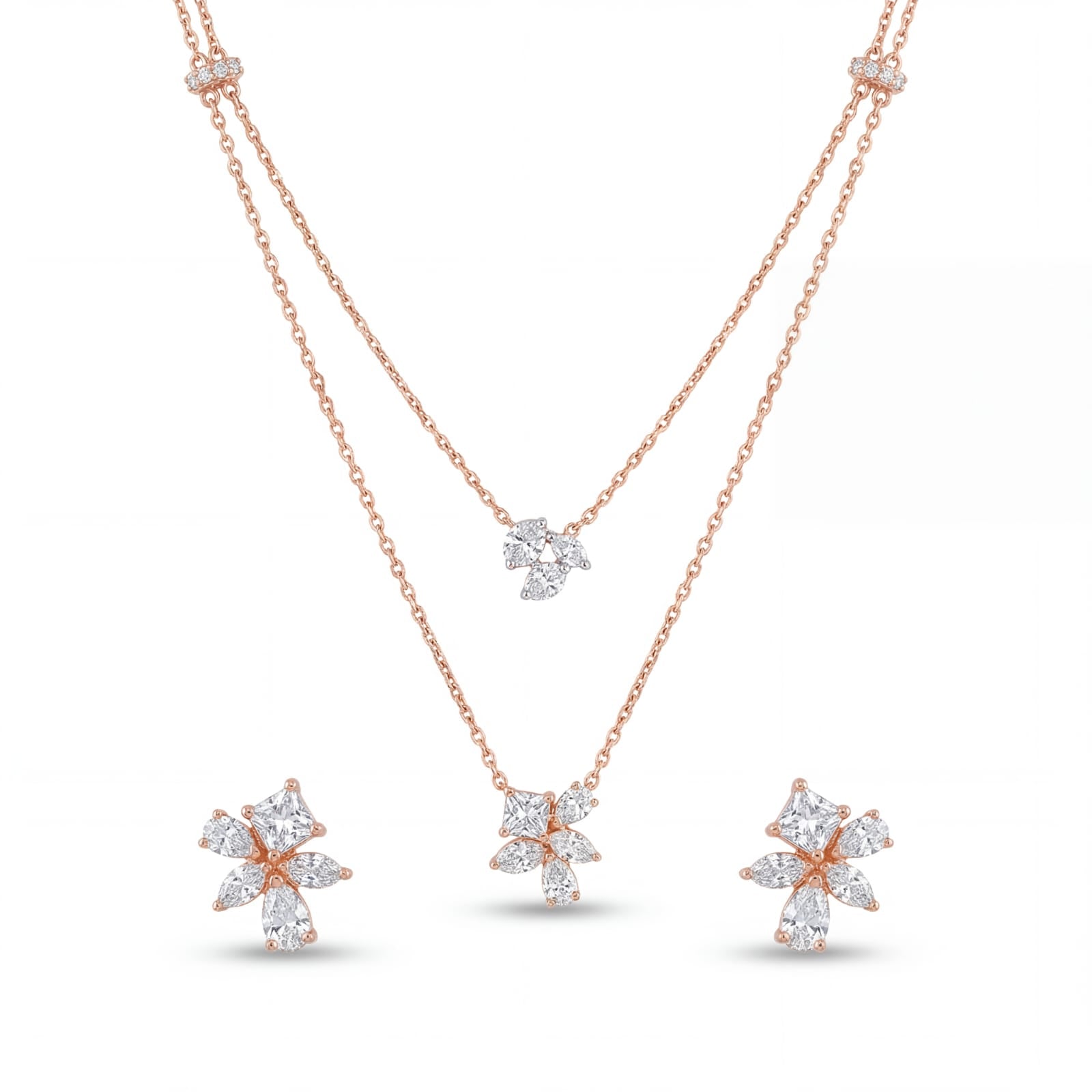 Stylish 18KT rose gold pendant set featuring a layered chain design with floral diamond pendants and coordinated earrings on a white background.
