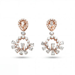 Elegant 18KT rose gold chandelier earrings featuring pear-shaped diamond tops with floral drop clusters on a white background.
