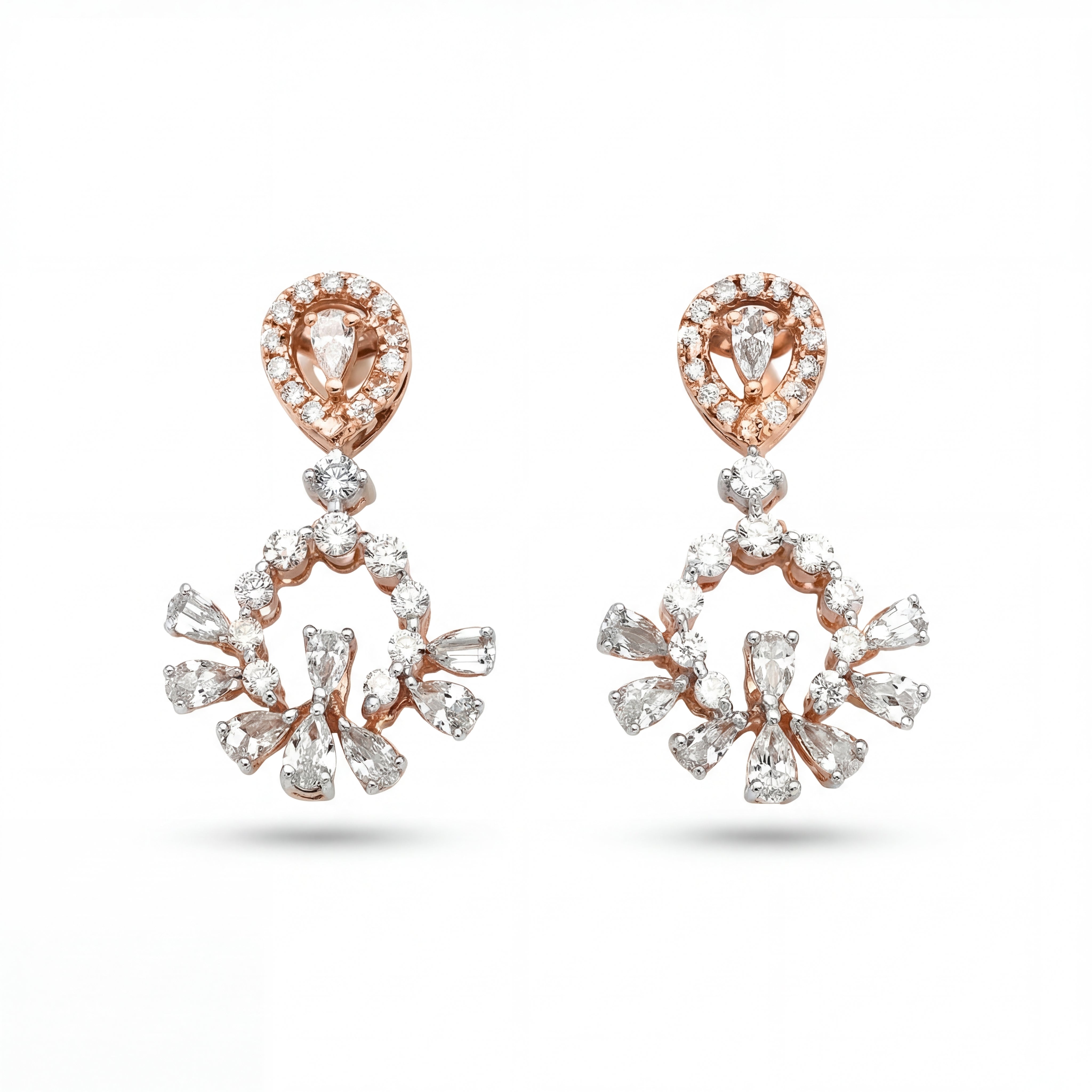 Elegant 18KT rose gold chandelier earrings featuring pear-shaped diamond tops with floral drop clusters on a white background.