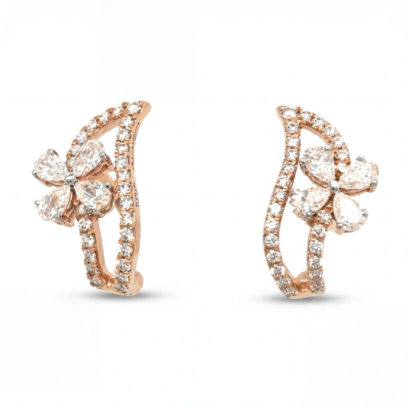 Elegant 18KT rose gold hoop earrings featuring floral diamond clusters with pavé diamond curved frames on a white background.
