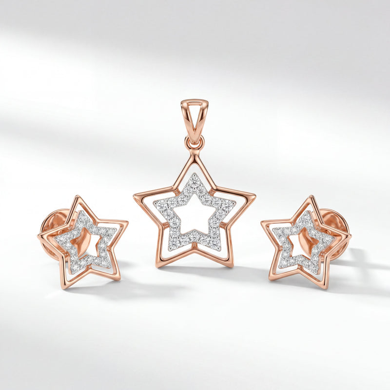 Elegant 18KT rose gold pendant set featuring a modern open star design with a sparkling diamond-studded inner star. The set includes a matching pendant and a pair of stud earrings, combining contemporary geometric styling with brilliant diamond accents for a chic and timeless look.
