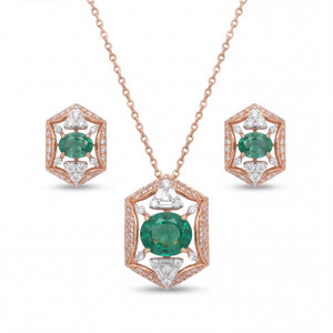 Elegant 18KT rose gold pendant set featuring hexagon-shaped emerald and diamond pendant with matching stud earrings on a white background.