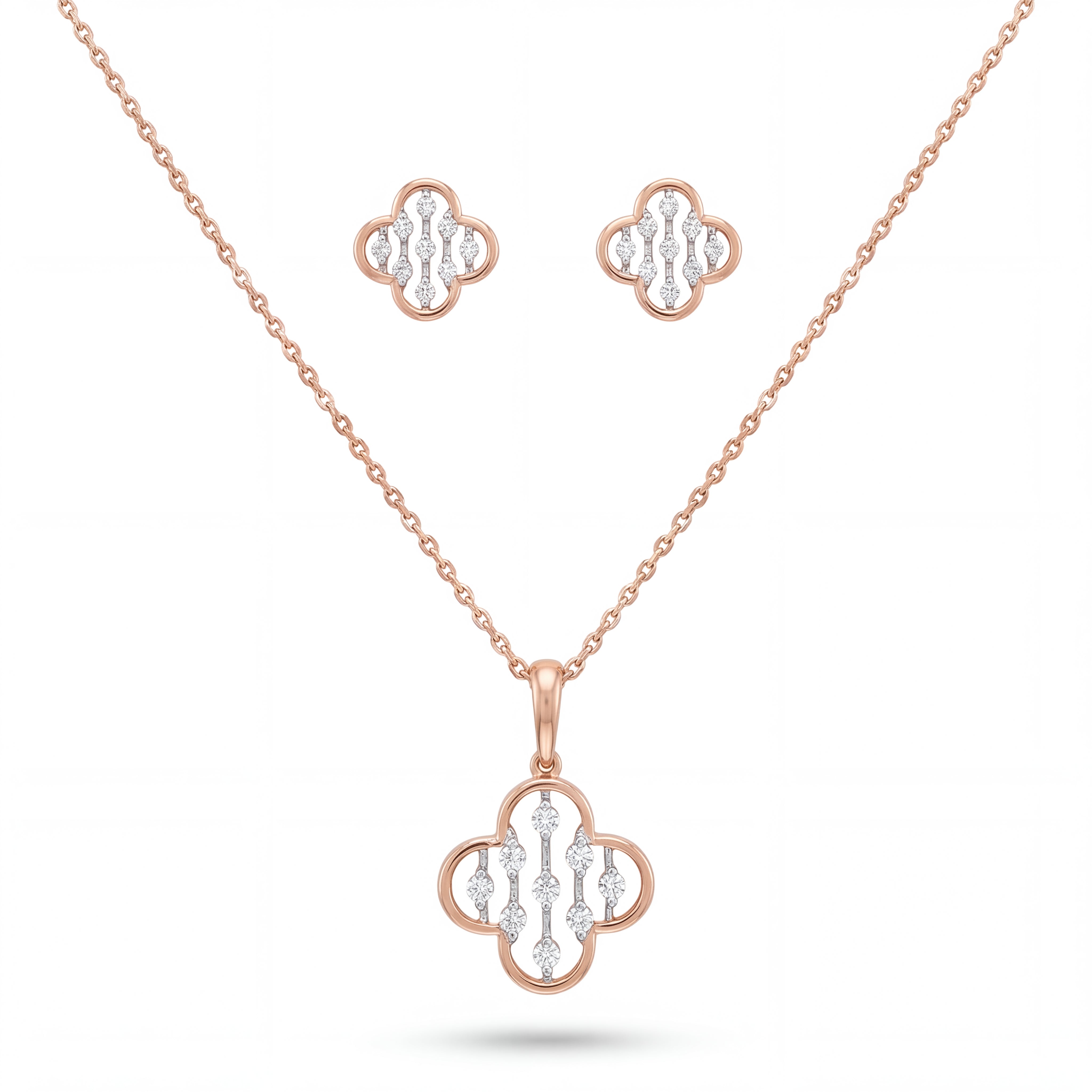 Beautiful 18KT rose gold necklace set showcasing floral clover motifs with sparkling diamond accents and matching earrings on a white background.