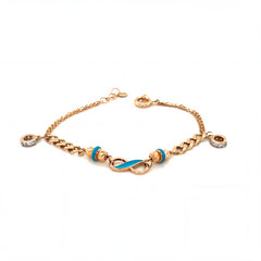 Luxurious 18KT rose gold bracelet featuring blue enamel infinity centerpiece with diamond-set protective charms on a white background.