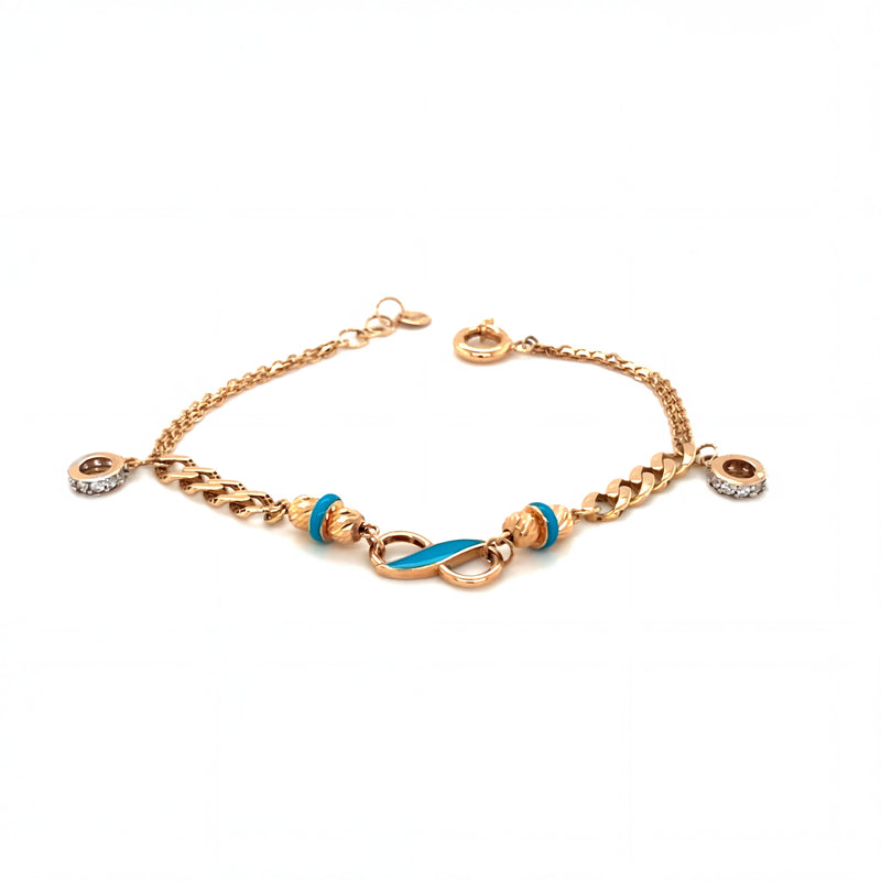 Luxurious 18KT rose gold bracelet featuring blue enamel infinity centerpiece with diamond-set protective charms on a white background.