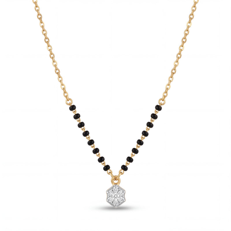 Elegant 18K gold mangalsutra necklace featuring black bead detailing and a sparkling diamond cluster pendant on a white background by Pachchigar Jewellers Ashokbhai.