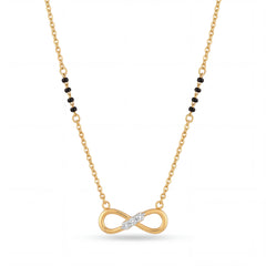 Elegant 18K gold mangalsutra necklace featuring an infinity symbol pendant with diamond accents, delicate black bead detailing, and fine chain on a white background by Pachchigar Jewellers Ashokbhai.