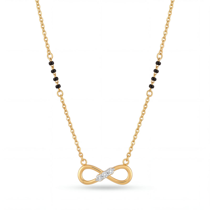 Elegant 18K gold mangalsutra necklace featuring an infinity symbol pendant with diamond accents, delicate black bead detailing, and fine chain on a white background by Pachchigar Jewellers Ashokbhai.