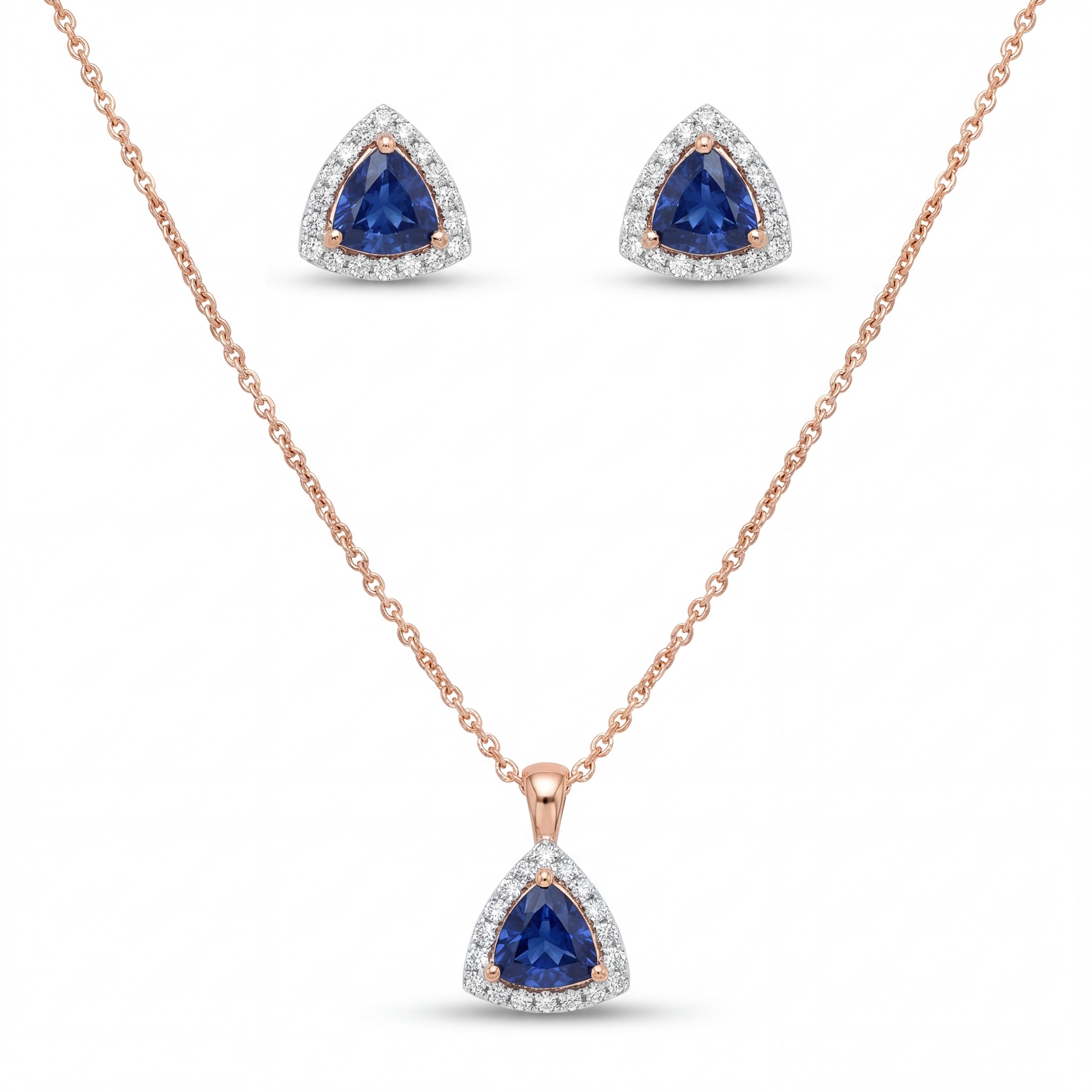 Elegant 18K rose gold blue sapphire diamond pendant earrings set featuring trillion cut blue sapphires with diamond halo necklace and matching stud earrings by Pachchigar Jewellers Ashokbhai