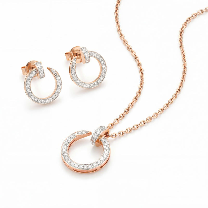 Elegant 18K rose gold diamond circle pendant earrings set featuring pavé diamond open circle pendant with matching hoop earrings by Pachchigar Jewellers Ashokbhai