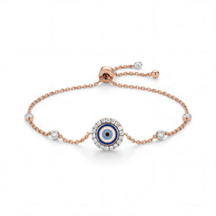 Elegant 18K rose gold diamond evil eye adjustable bracelet featuring blue enamel evil eye center motif with diamond halo and bezel set side diamonds by Pachchigar Jewellers Ashokbhai