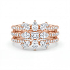 Elegant 18K rose gold diamond floral crown statement ring featuring pear cut and princess cut diamonds with pavé diamond bands by Pachchigar Jewellers Ashokbhai