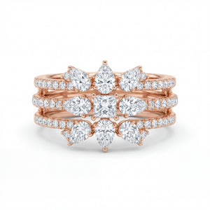 Elegant 18K rose gold diamond floral crown statement ring featuring pear cut and princess cut diamonds with pavé diamond bands by Pachchigar Jewellers Ashokbhai