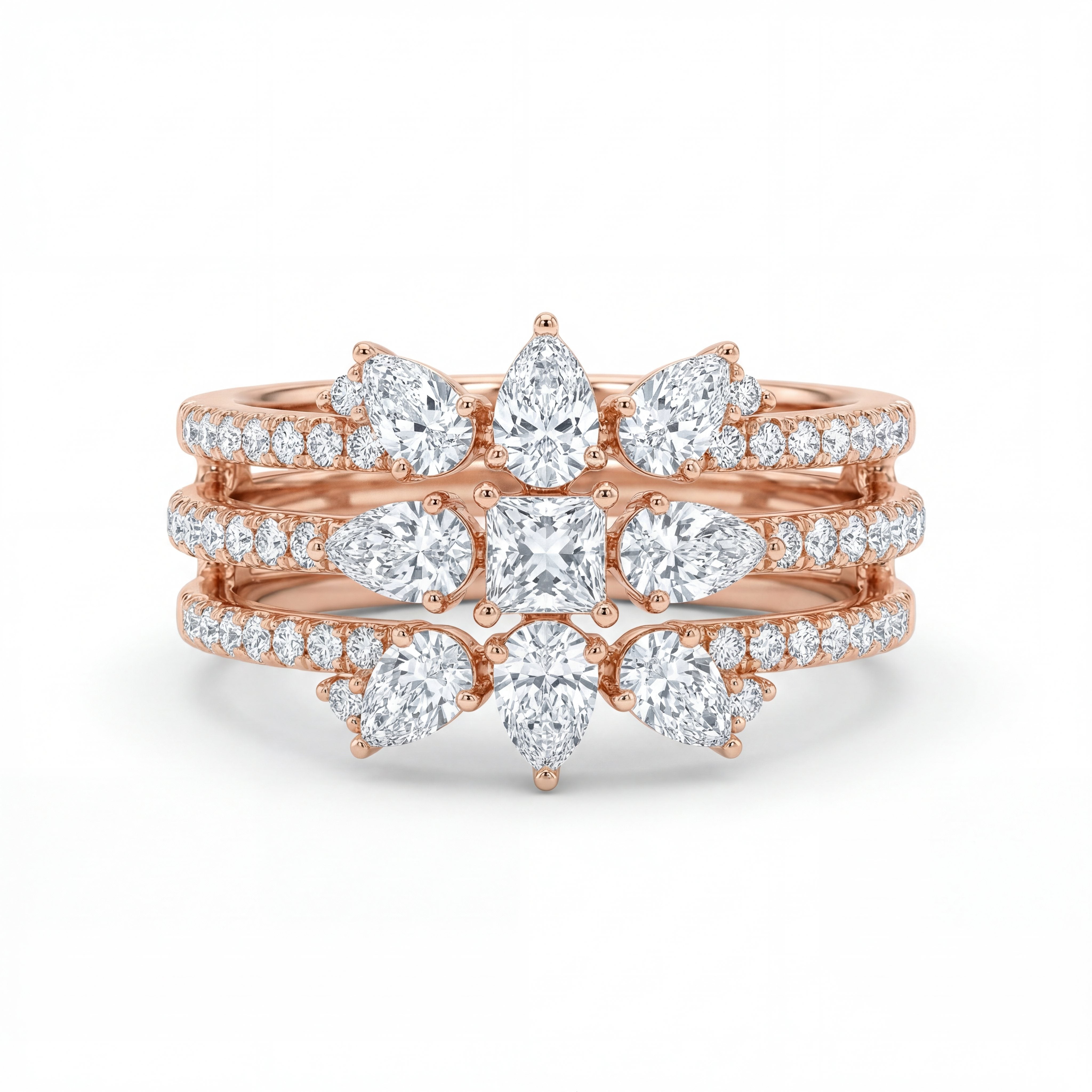 Elegant 18K rose gold diamond floral crown statement ring featuring pear cut and princess cut diamonds with pavé diamond bands by Pachchigar Jewellers Ashokbhai