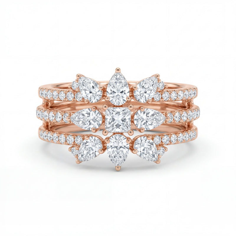 Elegant 18K rose gold diamond floral crown statement ring featuring pear cut and princess cut diamonds with pavé diamond bands by Pachchigar Jewellers Ashokbhai