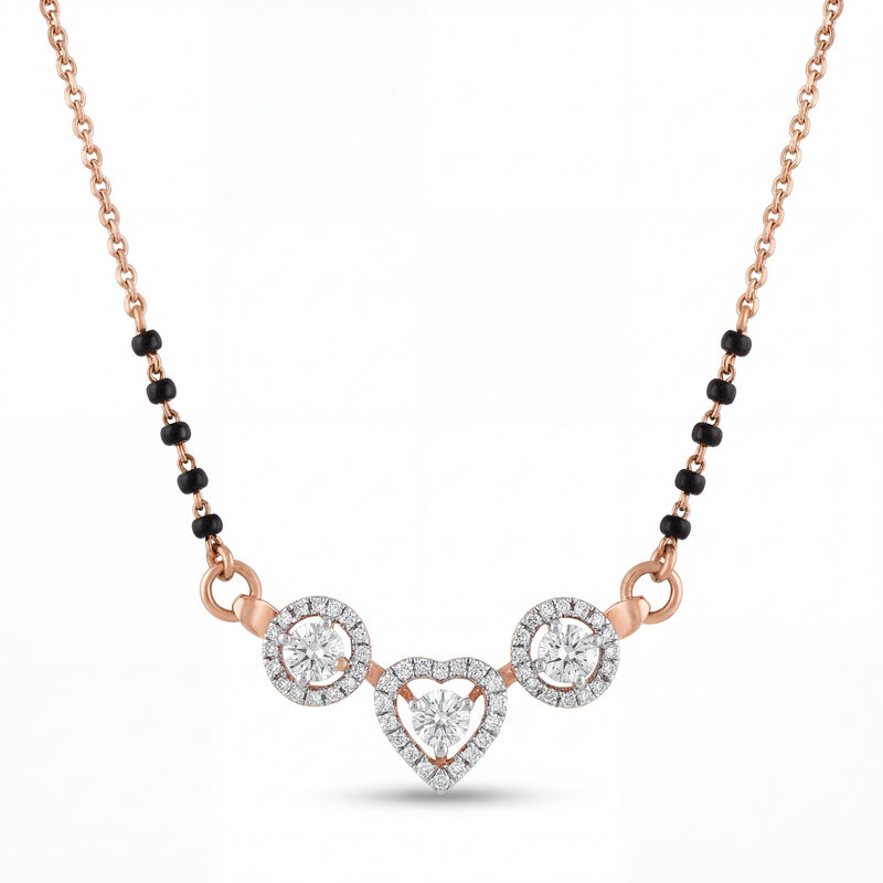 Elegant 18K rose gold diamond heart mangalsutra pendant necklace featuring heart shaped center diamond motif with round diamond halo accents and black bead chain by Pachchigar Jewellers Ashokbhai