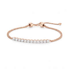 Elegant 18K rose gold diamond tennis adjustable bracelet featuring row of round brilliant diamonds with sliding clasp chain by Pachchigar Jewellers Ashokbhai