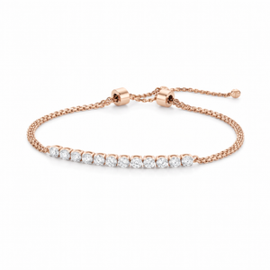 Elegant 18K rose gold diamond tennis adjustable bracelet featuring row of round brilliant diamonds with sliding clasp chain by Pachchigar Jewellers Ashokbhai